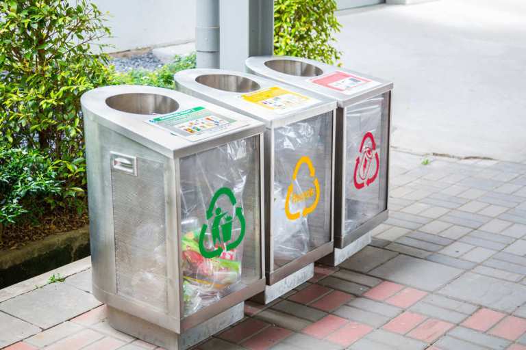 stock-photo-different-colored-bins-for-collection-of-recycle-materials-319139558